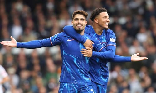Pedro Neto and Jadon Sancho of Chelsea celebrate scoring against Fulham in the Premier League, 2024/25