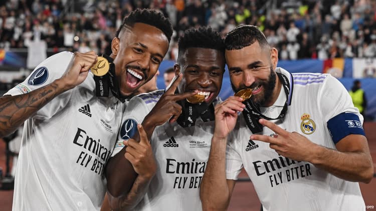Eder Militao, Vini Jr and Karim Benzema celebrate UEFA Super Cup success