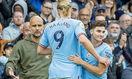 Pep Guardiola, Erling Haaland and Julian Alvarez.