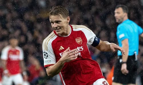 Martin Odegaard celebrates scoring for Arsenal against PSV in the Champions League