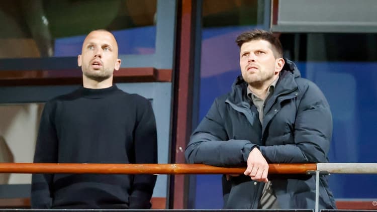 John Heitinga (links) samen met Klaas-Jan Huntelaar.