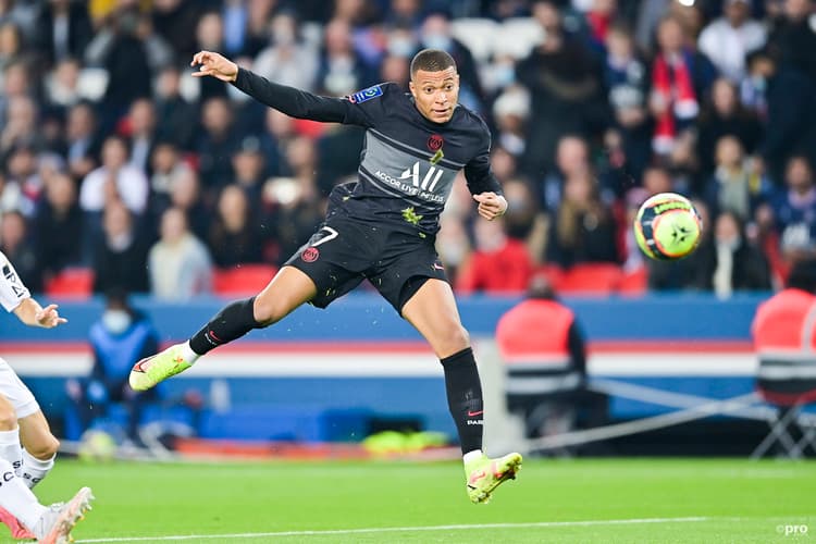 PSG's Kylian Mbappe shoots at goal in a Ligue 1 match vs Angers