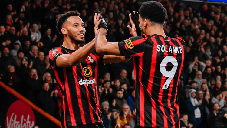 Lloyd Kelly and Dominic Solanke celebrate a Bournemouth goal
