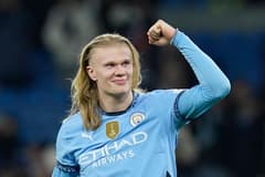 Erling Haaland celebrates Man City's victory over Chelsea