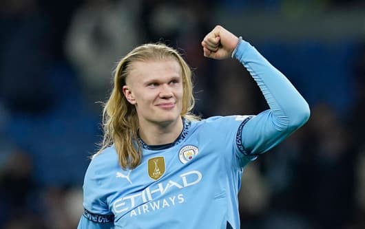 Erling Haaland celebrates Man City's victory over Chelsea