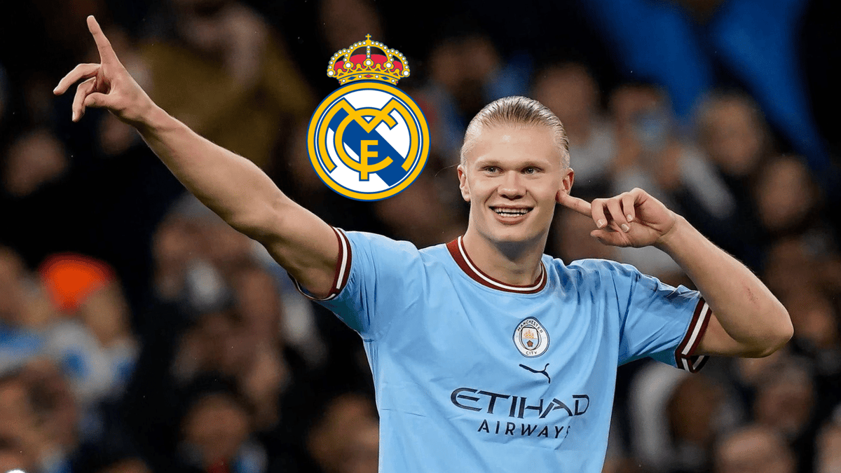 Erling Haaland of Manchester City with the Real Madrid badge