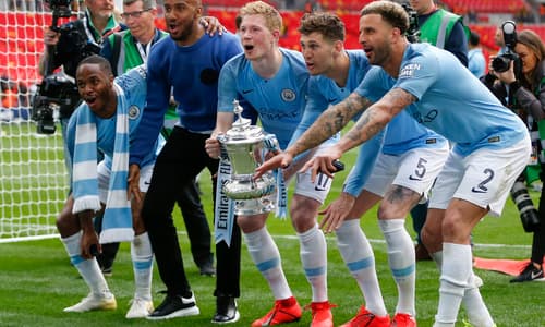 Manchester City players with the FA Cup.