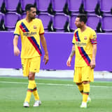 Lionel Messi and Sergio Busquets