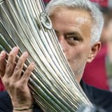 Jose Mourinho celebrates winning the Conference League with Roma