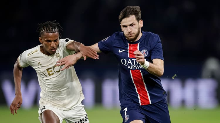 Hicham Boudaoui in action against PSG's Khvicha Kvaratskhelia