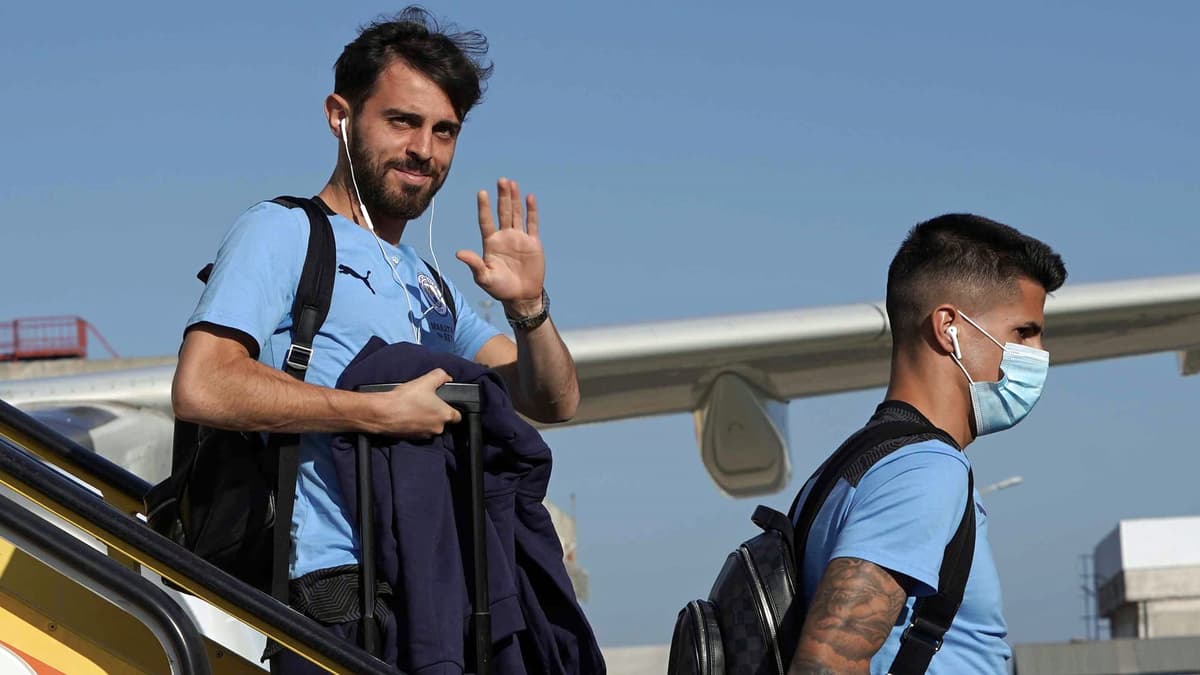 Man City teammates Bernardo Silva and Joao Cancelo.