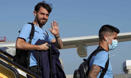 Man City teammates Bernardo Silva and Joao Cancelo.