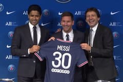 Lionel Messi at his PSG presentation with Nasser Al-Khelaifi and Leonardo