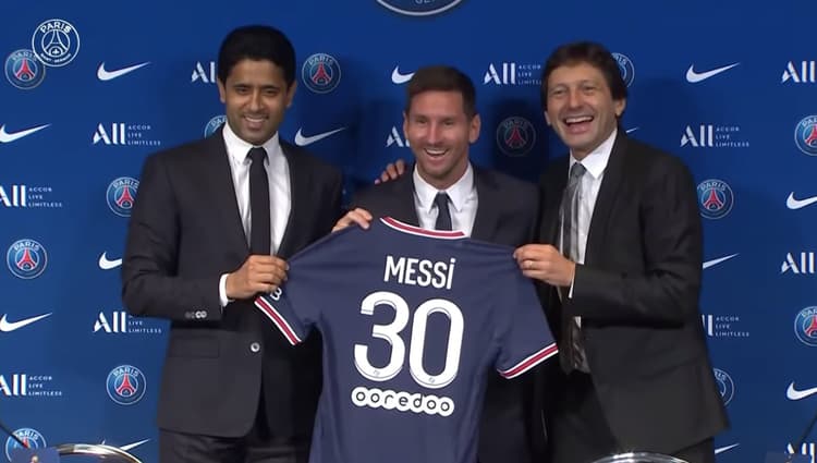 Lionel Messi at his PSG presentation with Nasser Al-Khelaifi and Leonardo