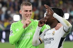 Andriy Lunin and Eduardo Camavinga of Real Madrid celebrate winning the 2023/24 Champions League