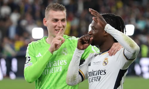 Andriy Lunin and Eduardo Camavinga of Real Madrid celebrate winning the 2023/24 Champions League