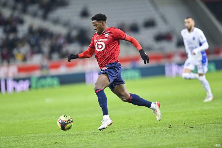 Jonathan David playing for Lille against Troyes in Ligue 1