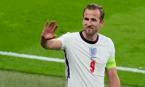 Tottenham striker Harry Kane waves to fans after helping England win their Euro 2020 group.