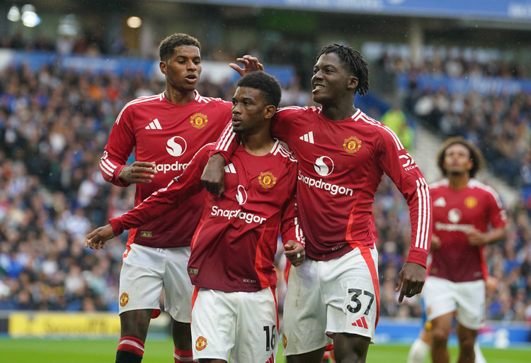 Amad Diallo celebrates scoring against Brighton