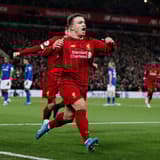 Xherdan Shaqiri celebrates scoring against Everton for Liverpool