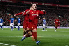 Xherdan Shaqiri celebrates scoring against Everton for Liverpool