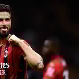 Olivier Giroud celebrates scoring for Milan against Cagliari in a Serie A match at the San Siro in 2021
