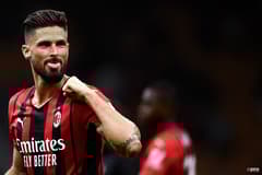 Olivier Giroud celebrates scoring for Milan against Cagliari in a Serie A match at the San Siro in 2021