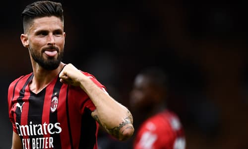 Olivier Giroud celebrates scoring for Milan against Cagliari in a Serie A match at the San Siro in 2021
