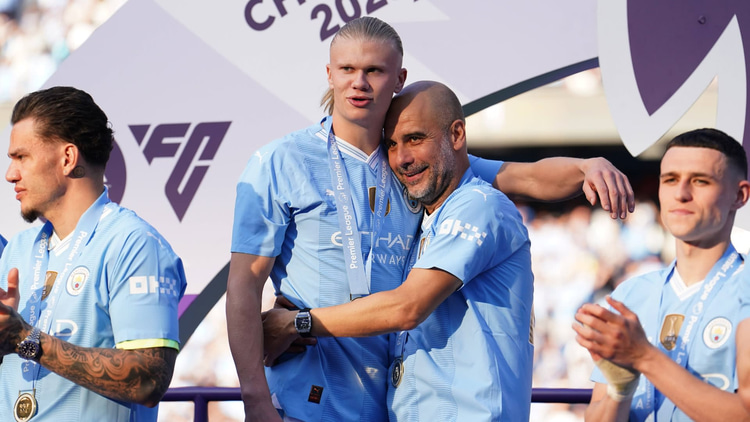 Pep Guardiola with Erling Haaland, Man City