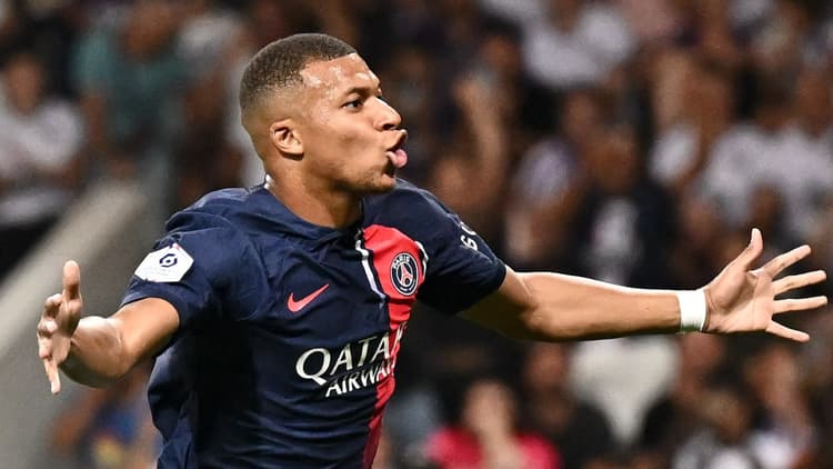 Kylian Mbappe celebrates scoring against Toulouse