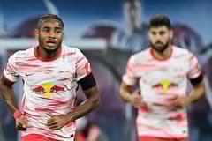 Nkunku and Gvardiol in action for RB Leipzig.