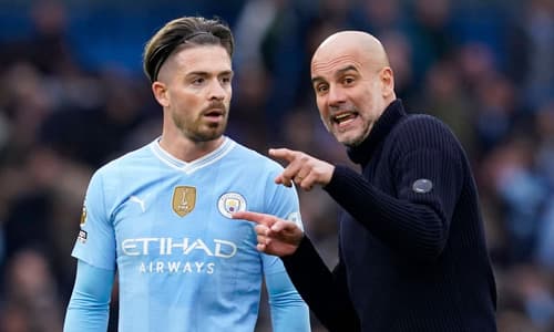 Pep Guardiola speaks to Jack Grealish after Man City draw 0-0 with Arsenal in the Premier League