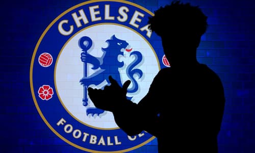 A silhouette of Tyler Adams, and the Chelsea badge, on a blue brick wall background