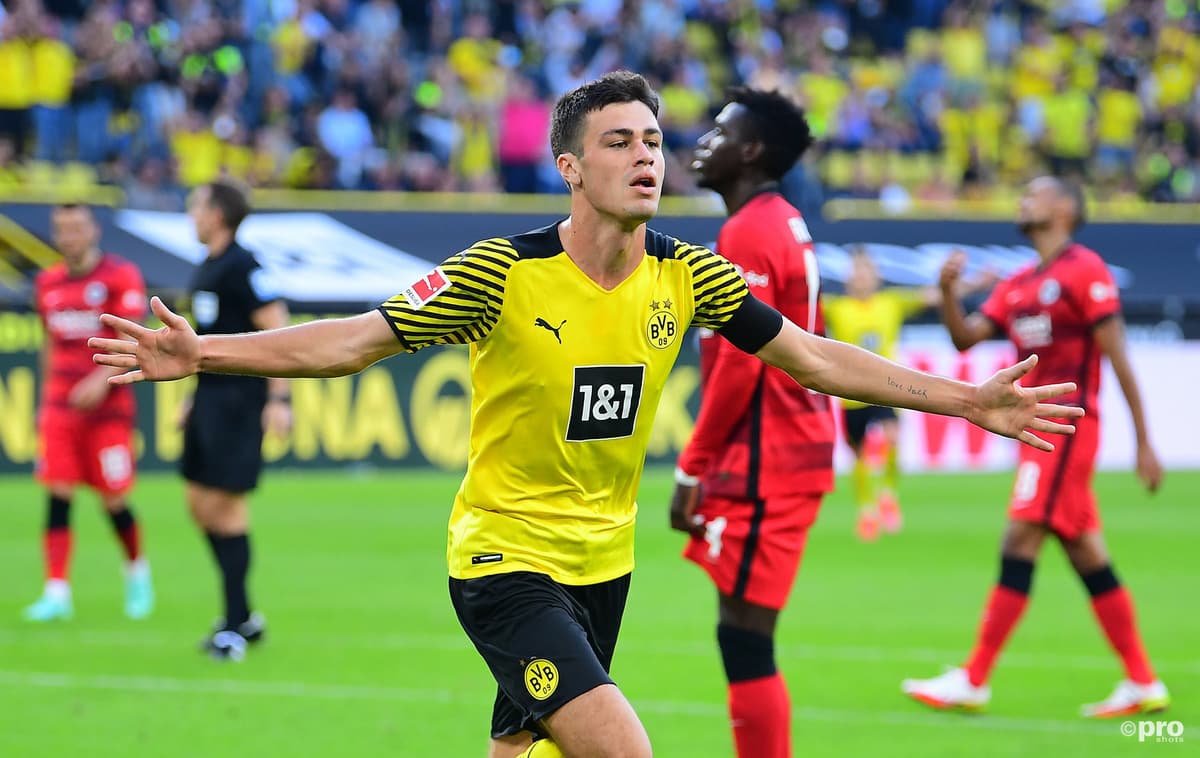 Gio Reyna celebrates scoring for Dortmund against Frankfurt in the Bundesliga