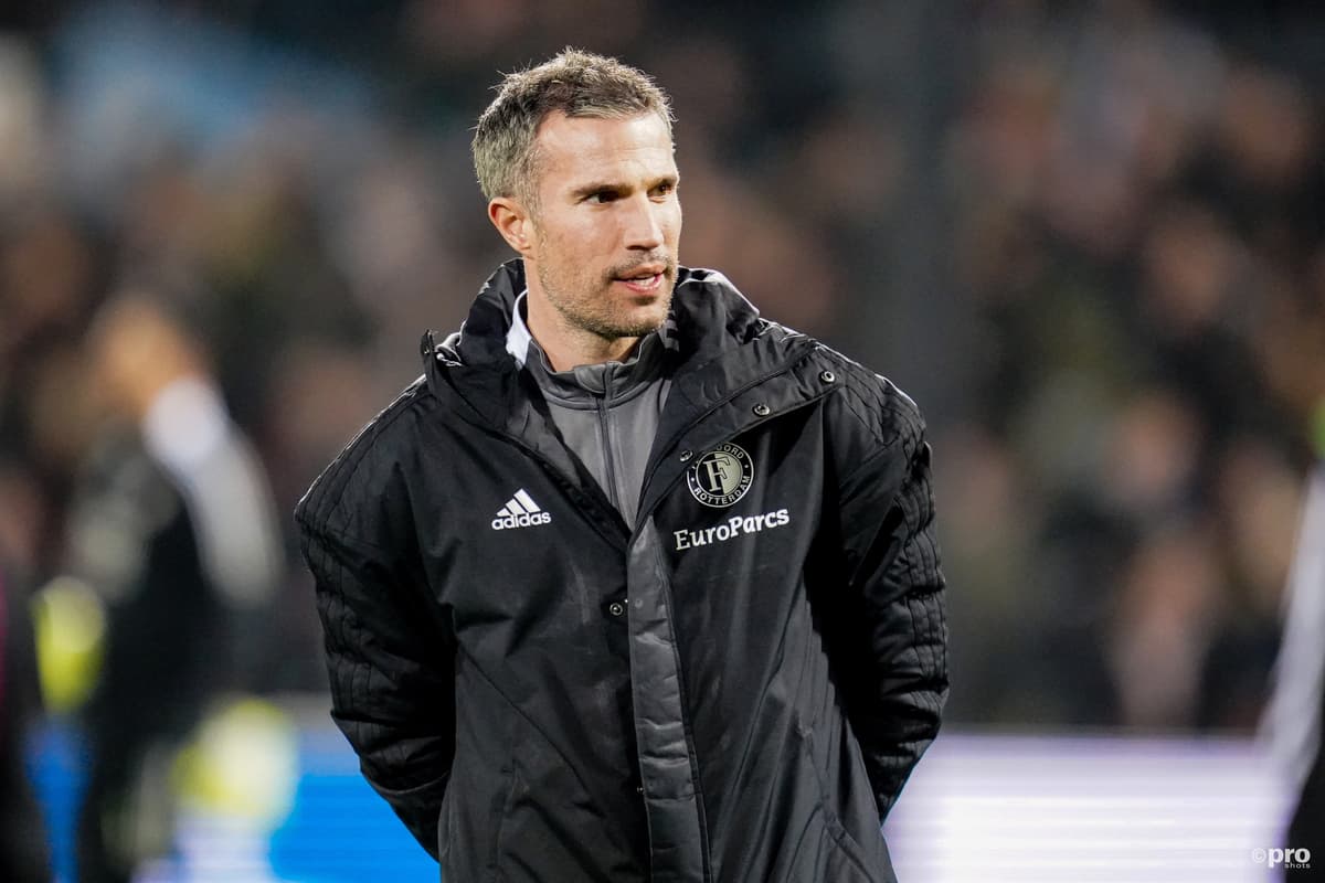 Robin van Persie working as a coach during a Feyenoord match.