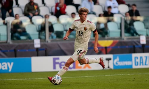 Charles De Ketelaere controls the ball going forward for Belgium in the UEFA Nations League Third Place Play-off against Italy at Allianz Stadium in 2021.