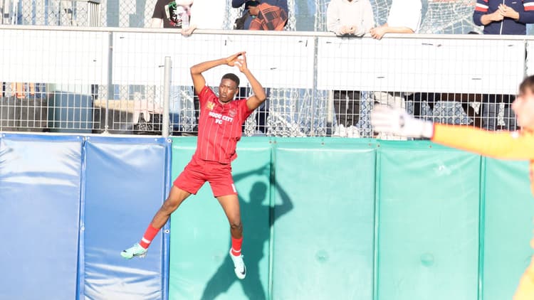 Ibrahim Hafiz Umar celebrates scoring for Ojodu City Academy in a tournament in Italy