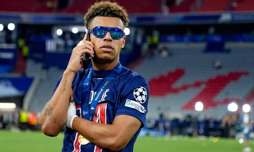 Desire Doue celebrates winning the Champions League with PSG
