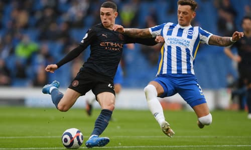 Ben White battles with Phil Foden, Brighton v Man City