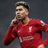 Roberto Firmino celebrates for Liverpool in their UCL win over Inter