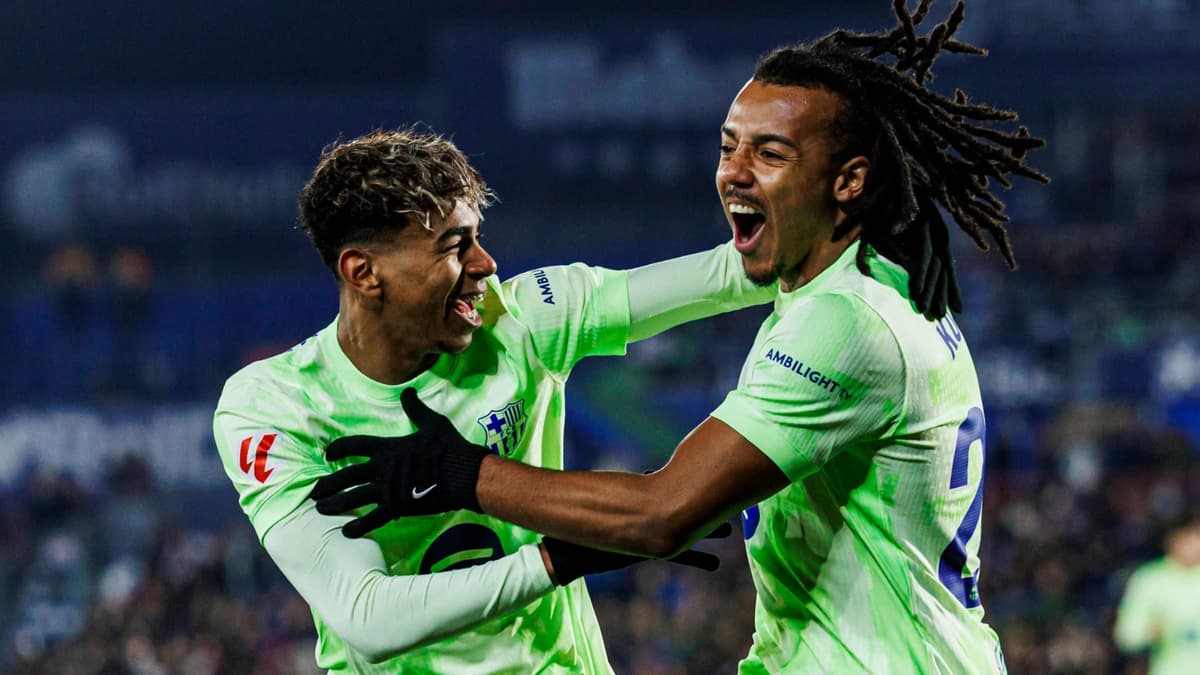 Lamine Yamal and Jules Kounde of Barcelona celebrate scoring against Getafe, 2024/25