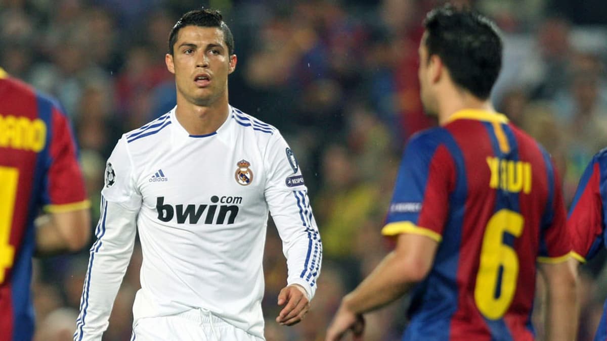 Cristiano Ronaldo and Xavi playing in El Clasico