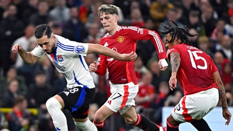 Rayan Cherki in action against Manchester United