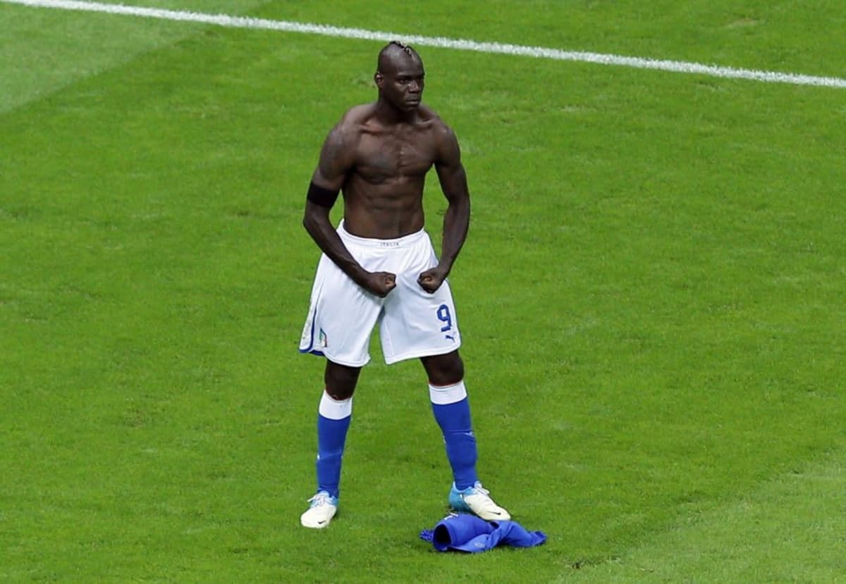 Mario Balotelli celebrates scoring against Germany for Italy at Euro 2012