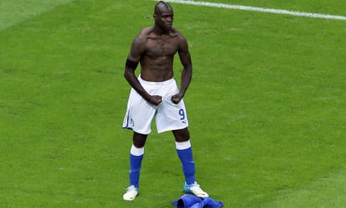 Mario Balotelli celebrates scoring against Germany for Italy at Euro 2012