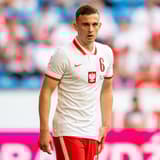 Kacper Kozlowski playing for Poland in a friendly against Iceland in 2021