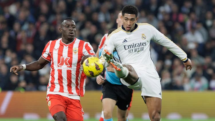 Dion Lopy in action against Jude Bellingham