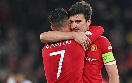 Cristiano Ronaldo and Harry Maguire in action for Man Utd.