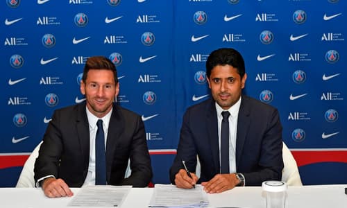 Lionel Messi and PSG CEO Nasser Al-Khelaifi 