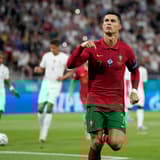 Juventus star Cristiano Ronaldo celebrates equalling Ali Daei's record for international goals for Portugal against France at Euro 2020.